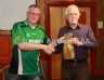 North Antrim Cultural Officer James Gaston presenting Quiz Master Paul Fitzpatrick with a small token